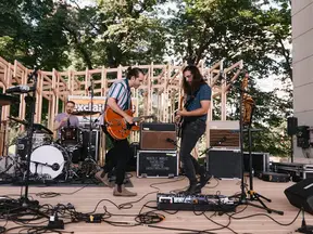 Jazz band performing live on a garden stage